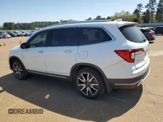 2022 Honda Pilot Touring 7-Passenger z VIN 5FNYF5H66NB025193, wystawiony jako Copart lot #50054505 z przebiegiem 25 650 mil mil oraz Czysty tytuł • Clean title. Historia ofert i sprzedaży dostępna na DreamBid. Obrazek 2.