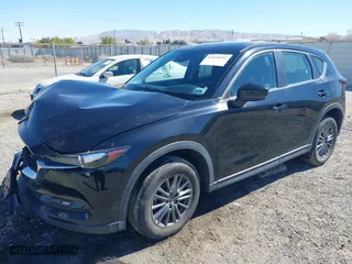 2017 Mazda CX-5 Sport with VIN JM3KFBBL2H0144792, listed as a IAAI auction lot 41654031 with 77,107 mi miles. Bid and sale history available at carsss.com. Image 17.