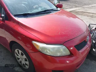 2010 Toyota Corolla with VIN 1NXBU4EE1AZ186145, listed as a IAAI auction lot 42318162 with 200,416 mi miles and . Bid and sale history available at DreamBid. Image 12.