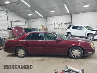 2002 Cadillac DeVille with VIN 1G6KD54Y12U214732, listed as a IAAI auction lot 42018412 with 139,474 mi miles. Bid and sale history available at carsss.com. Image 13.