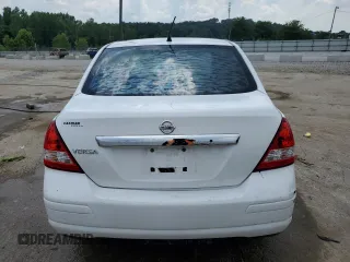 2011 Nissan Versa S z VIN 3N1BC1AP6BL449094, wystawiony jako Copart lot #62844835 z przebiegiem 166 749 mil mil oraz Szkoda całkowita • Salvage title. Historia ofert i sprzedaży dostępna na DreamBid. Obrazek 6.