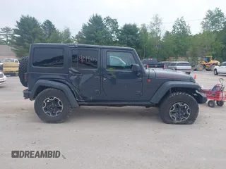2016 Jeep Wrangler Unlimited Rubicon with VIN 1C4HJWFG6GL346862, listed as a IAAI auction lot 42441610 with 94,227 mi miles and . Bid and sale history available at DreamBid. Image 13.