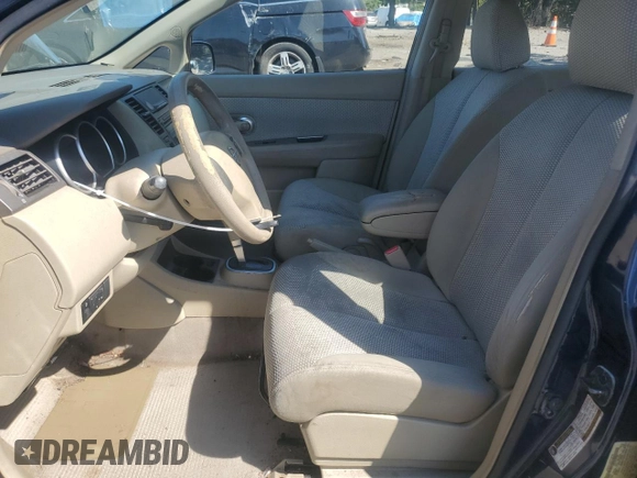 2007 Nissan Versa 1.8 SL with VIN 3N1BC11E27L432802, listed as a Copart auction lot 71018594 with 118,795 mi miles and Salvage Title. Bid and sale history available at carsss.com. Image 7.