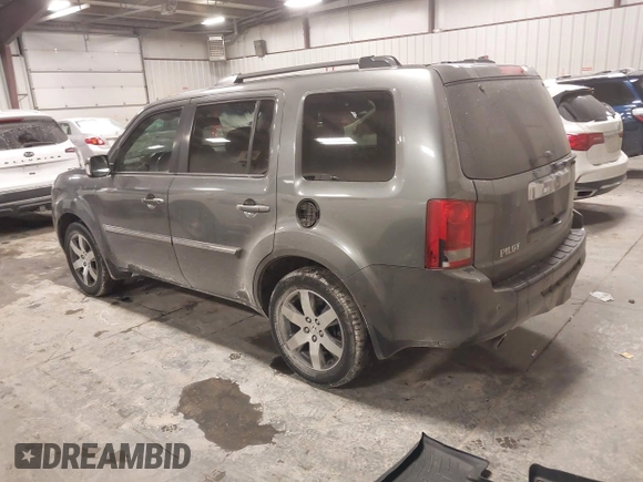 2012 Honda Pilot Touring with VIN 5FNYF4H98CB030879, listed as a IAAI auction lot 41619003 with 201,131 mi miles. Bid and sale history available at carsss.com. Image 3.