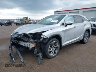 2018 Lexus RX 450hL Premium with VIN JTJDGKCA6J2003954, listed as a IAAI auction lot 42259774 with 93,706 mi miles and . Bid and sale history available at DreamBid. Image 2.