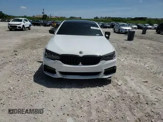 2018 BMW 5 Series 540i with VIN WBAJE5C58JWA96615, listed as a Copart auction lot 56117205 with 87,211 mi miles and Salvage title. Bid and sale history available at DreamBid. Image 13.