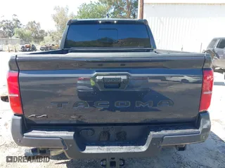 2024 Toyota Tacoma 4WD SR5 with VIN 3TMLB5JN4RM039036, listed as a IAAI auction lot 41813562 with 2,112 mi miles. Bid and sale history available at carsss.com. Image 17.