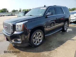 2015 GMC Yukon Denali with VIN 1GKS2CKJXFR547358, listed as a Copart auction lot 63906734 with 163,980 mi miles and Salvage Title. Bid and sale history available at carsss.com. Image 1.