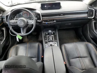 2023 Mazda CX-50 Premium z VIN 7MMVABDYXPN103342, wystawiony jako Copart lot #56426525 z przebiegiem 37 143 mil mil oraz Szkody całkowita. Historia ofert i sprzedaży dostępna na DreamBid. Obrazek 8.