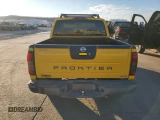 2004 Nissan Frontier XE z VIN 1N6ED27T34C449972, wystawiony jako Copart lot #87205714 z przebiegiem 254 636 mil mil oraz Szkoda całkowita • Salvage title. Historia ofert i sprzedaży dostępna na DreamBid. Obrazek 6.