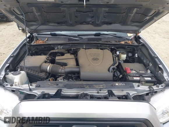 2018 Toyota Tacoma SR with VIN 3TMCZ5AN4JM130307, listed as a IAAI auction lot 41541477 with 74,369 mi miles and . Bid and sale history available at DreamBid. Image 10.