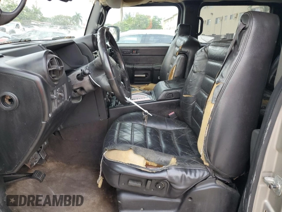 2006 Hummer H2 z VIN 5GRGN23U26H101561, wystawiony jako Copart lot #89308685 z przebiegiem 327 103 mil mil oraz Tytuł czysty. Historia ofert i sprzedaży dostępna na DreamBid. Obrazek 7.
