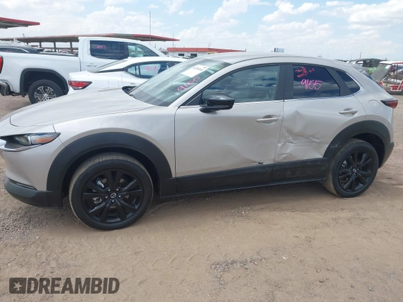 2024 Mazda CX-30 S Select Sport with VIN 3MVDMBBM3RM657918, listed as a IAAI auction lot 42218316 with 27,595 mi miles and . Bid and sale history available at carsss.com. Image 6.