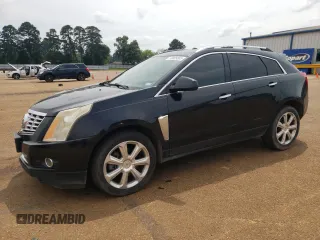 2014 Cadillac SRX Performance Collection z VIN 3GYFNCE38ES525883, wystawiony jako Copart lot #55085505 z przebiegiem 160 609 mil mil oraz Szkoda całkowita • Salvage title. Historia ofert i sprzedaży dostępna na DreamBid. Obrazek 1.