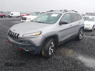 2014 Jeep Cherokee Trailhawk with VIN 1C4PJMBB3EW222747, listed as a IAAI auction lot 41622880 with 183,349 mi miles. Bid and sale history available at carsss.com. Image 20.