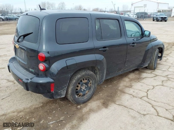 2011 Chevrolet HHR LS with VIN 3GNBAAFW1BS560779, listed as a IAAI auction lot 41590007 with NaN miles. Bid and sale history available at carsss.com. Image 4.