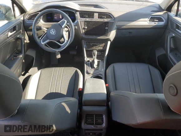 2023 Volkswagen Tiguan SE with VIN 3VVMB7AX9PM018778, listed as a Copart auction lot 50565555 with 9,758 mi miles and Salvage Title. Bid and sale history available at DreamBid. Image 8.