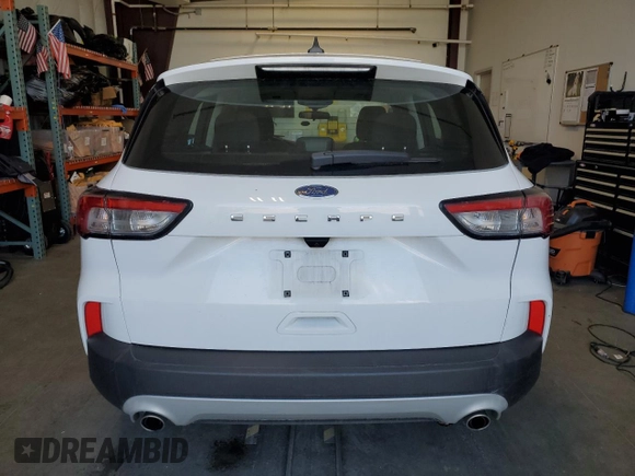 2021 Ford Escape S with VIN 1FMCU0F67MUA13738, listed as a Copart auction lot 53201605 with 104,099 mi miles and Clean title. Bid and sale history available at DreamBid. Image 6.
