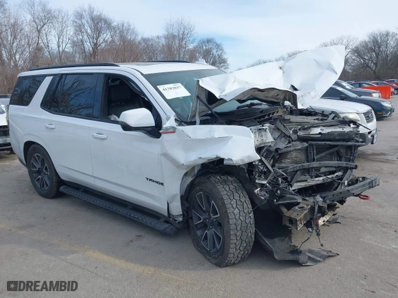 2021 Chevrolet Tahoe Z71 with VIN 1GNSKPKDXMR318664, listed as a IAAI auction lot 41382037 with 136,125 mi miles. Bid and sale history available at carsss.com. Image 1.