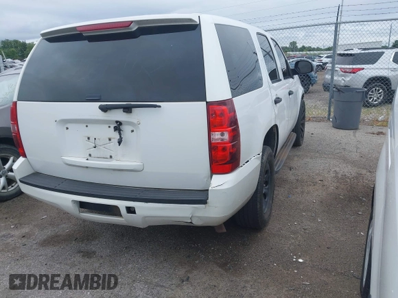 2012 Chevrolet Tahoe Commercial with VIN 1GNLC2E02CR322901, listed as a IAAI auction lot 42679887 with 251,794 mi miles and . Bid and sale history available at DreamBid. Image 4.