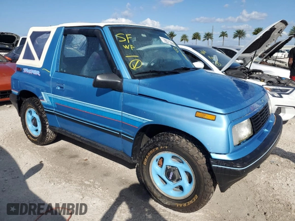 1994 Geo Tracker z VIN 2CNBE18U0R6940807, wystawiony jako Copart lot #78071244 z przebiegiem 116 472 mil mil oraz Nie do naprawy. Historia ofert i sprzedaży dostępna na DreamBid. Obrazek 2.