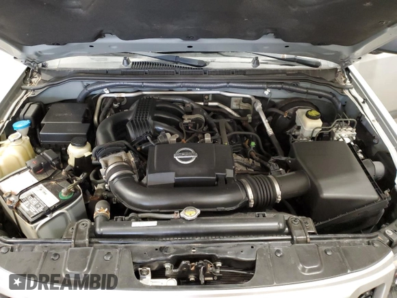 2014 Nissan Xterra X with VIN 5N1AN0NW8EN811098, listed as a Copart auction lot 54753235 with 124,741 mi miles and Clean Title. Bid and sale history available at DreamBid. Image 12.