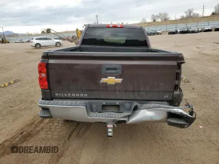 2016 Chevrolet Silverado 1500 LT with VIN 3GCUKREC9GG262656, listed as a Copart auction lot 44765435 with 112,940 mi miles and Salvage Title. Bid and sale history available at DreamBid. Image 6.