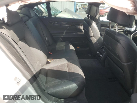 2015 BMW 7 Series 740Li with VIN WBAYE4C52FD947168, listed as a Copart auction lot 71287564 with 103,444 mi miles and Salvage Title. Bid and sale history available at DreamBid. Image 10.