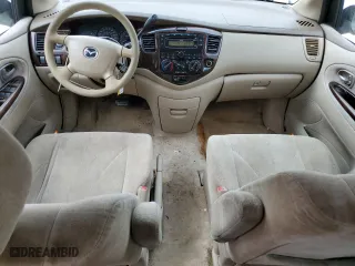 2000 Mazda MPV DX with VIN JM3LW28G0Y0116245, listed as a Copart auction lot 71654914 with 330,693 mi miles and Salvage Title. Bid and sale history available at carsss.com. Image 8.