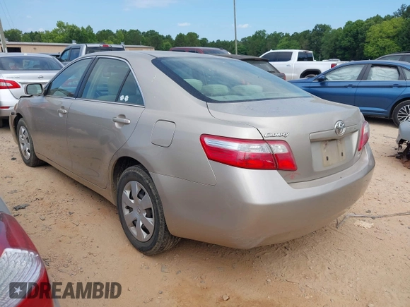 2007 Toyota Camry CE with VIN 4T1BE46K97U569695, listed as a IAAI auction lot 39701395 with 282,284 mi miles and . Bid and sale history available at DreamBid. Image 3.