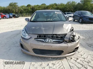 2014 Hyundai Accent GLS z VIN KMHCT4AEXEU680071, wystawiony jako Copart lot #50253905 z przebiegiem 84 454 mil mil oraz Szkoda całkowita • Salvage title. Historia ofert i sprzedaży dostępna na DreamBid. Obrazek 5.