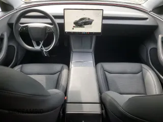 2025 Tesla Model 3 Long Range with VIN 5YJ3E1EAXSF878982, listed as a Copart auction lot 60302315 with 4,312 mi miles and Salvage title. Bid and sale history available at DreamBid. Image 8.