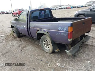 1995 Nissan Frontier XE with VIN 1N6SD11Y4SC318791, listed as a IAAI auction lot 42335599 with Not provided miles and . Bid and sale history available at DreamBid. Image 3.