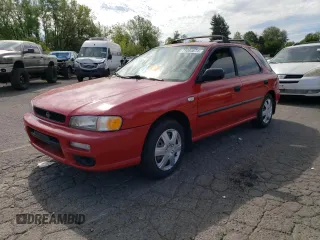 1997 Subaru Impreza L with VIN JF1GF435XVH810083, listed as a Copart auction lot 71054674 with 155,322 mi miles and Salvage title. Bid and sale history available at DreamBid. Image 1.