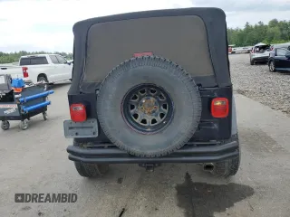 1997 Jeep Wrangler Sport with VIN 1J4FY19S2VP452229, listed as a Copart auction lot 60422775 with 164,346 mi miles and Clean title. Bid and sale history available at DreamBid. Image 6.