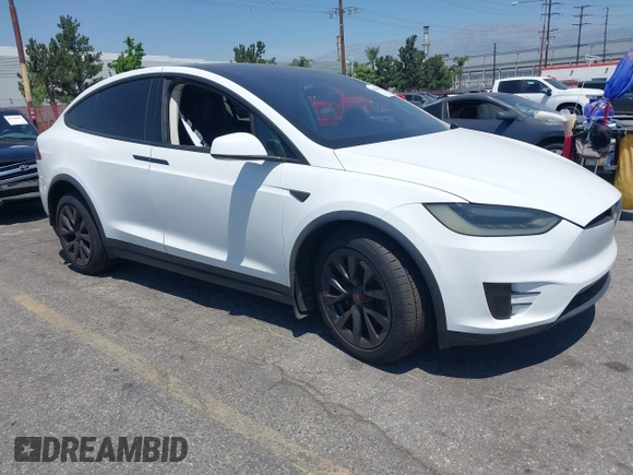 2016 Tesla Model X 70D z VIN 5YJXCAE29GF002170, wystawiony jako IAAI lot #42334842 z przebiegiem 119 104 mil mil oraz . Historia ofert i sprzedaży dostępna na DreamBid. Obrazek 1.