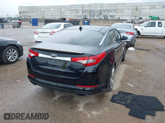 2013 Kia Optima SX with VIN 5XXGR4A64DG207512, listed as a IAAI auction lot 42483528 with 127,748 mi miles and . Bid and sale history available at DreamBid. Image 4.