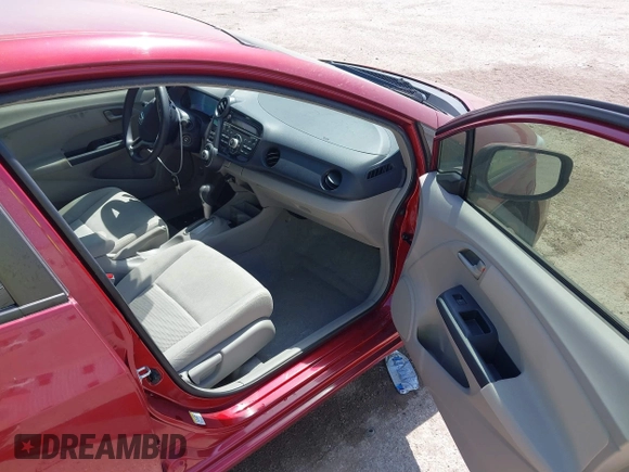 2010 Honda Insight EX with VIN JHMZE2H73AS009253, listed as a IAAI auction lot 41882569 with 104,839 mi miles and . Bid and sale history available at DreamBid. Image 5.