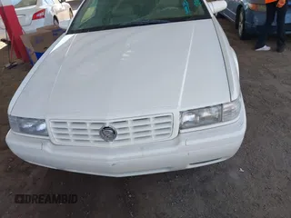 2002 Cadillac Eldorado z VIN 1G6EC12922B106670, wystawiony jako IAAI lot #41648782 z przebiegiem 174 320 mil mil oraz . Historia ofert i sprzedaży dostępna na DreamBid. Obrazek 6.