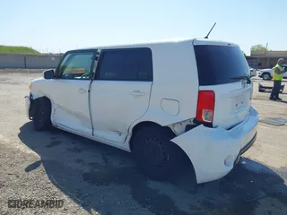 2013 Scion xB with VIN JTLZE4FEXDJ037953, listed as a IAAI auction lot 42002490 with 106,206 mi miles. Bid and sale history available at carsss.com. Image 3.