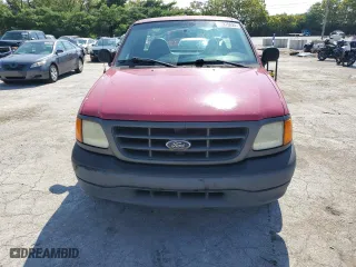 2004 Ford F-150 Heritage XL with VIN 2FTRF17274CA77997, listed as a Copart auction lot 68870024 with NaN miles and Salvage Title. Bid and sale history available at carsss.com. Image 5.