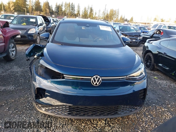 2023 Volkswagen ID.4 Pro z VIN 1V2DNPE81PC017620, wystawiony jako IAAI lot #41573053 z przebiegiem 15 462 mil mil oraz . Historia ofert i sprzedaży dostępna na DreamBid. Obrazek 13.