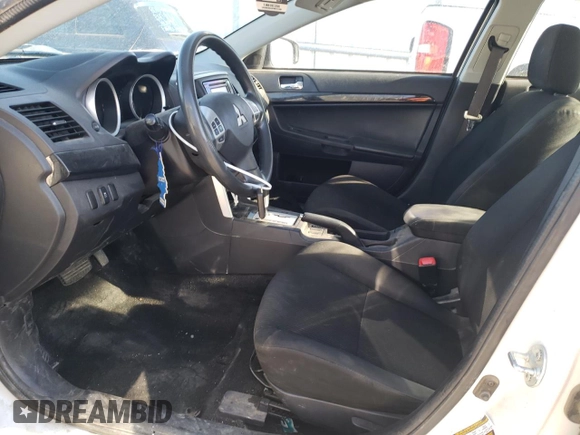 2017 Mitsubishi Lancer ES with VIN JA32V2FW6HU014960, listed as a Copart auction lot 70043804 with 102,710 mi miles and Salvage Title. Bid and sale history available at carsss.com. Image 7.