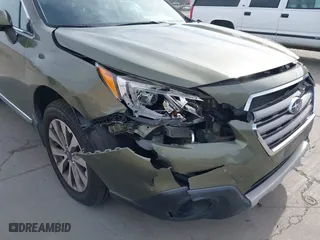 2017 Subaru Outback Touring with VIN 4S4BSETCXH3371887, listed as a IAAI auction lot 41692515 with 57,039 mi miles. Bid and sale history available at carsss.com. Image 6.