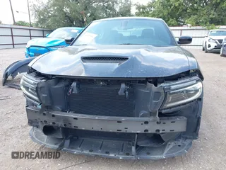 2023 Dodge Charger GT with VIN 2C3CDXHG1PH529771, listed as a IAAI auction lot 42159336 with 55,162 mi miles and . Bid and sale history available at DreamBid. Image 6.