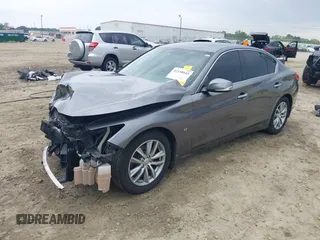 2015 Infiniti Q50 Premium with VIN JN1BV7AP7FM338434, listed as a IAAI auction lot 42158445 with 115,685 mi miles and . Bid and sale history available at DreamBid. Image 18.