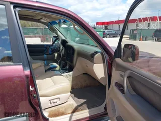 2002 Toyota Land Cruiser with VIN JTEHT05J422022565, listed as a IAAI auction lot 42042565 with 550,000 mi miles. Bid and sale history available at carsss.com. Image 5.