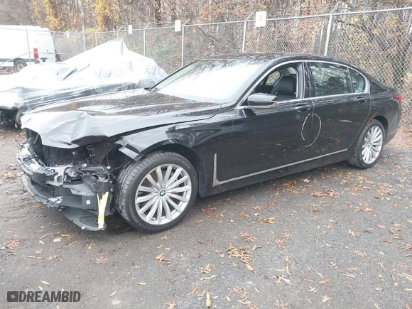 2020 BMW 7 Series 740i xDrive with VIN WBA7T4C03LGF97312, listed as a IAAI auction lot 40970033 with 60,231 mi miles. Bid and sale history available at carsss.com. Image 2.