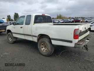 1997 Toyota T100 DX z VIN JT4UN22DXV0041578, wystawiony jako Copart lot #77388104 z przebiegiem 333 587 mil mil oraz Tytuł czysty. Historia ofert i sprzedaży dostępna na DreamBid. Obrazek 2.