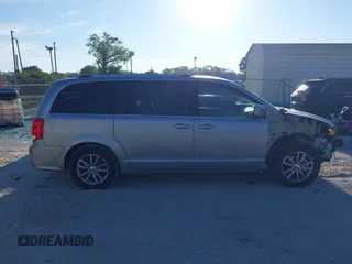 2018 Dodge Grand Caravan SXT with VIN 2C4RDGCG5JR267428, listed as a IAAI auction lot 41877661 with 103,633 mi miles and . Bid and sale history available at DreamBid. Image 14.